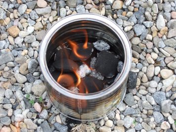 Briquets in a can with small flame